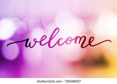 welcome vector lettering on blurred lights background
