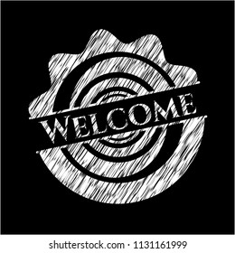 Welcome written on a blackboard