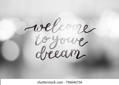 welcome to your dream, vector lettering on blurred background
