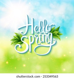 Welcoming the springtime - Hello Spring - with an abstract textured background of a sunny green spring meadow with flowing white text and green leaves, vector illustration.