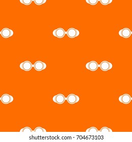 Welding glasses pattern repeat seamless in orange color for any design. Vector geometric illustration