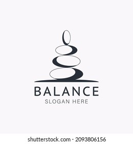 Wellness balance stone logo vector illustration. Zen stone, therapy vector icon illustration. The balancing cairn - a symbol of harmony, tranquility and relaxation