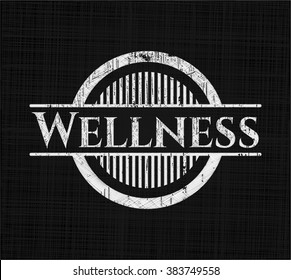 Wellness chalk emblem written on a blackboard