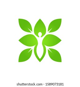 Wellness logo -  silhouette of healthy figure in leaves - negative space