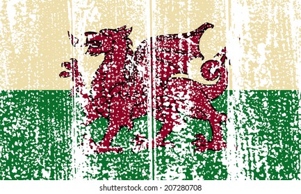 Welsh grunge flag. Vector illustration. Grunge effect can be cleaned easily.