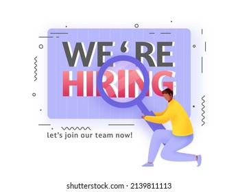 We're Hiring Lettering With Staff Man Looking New Member To Join The Team On Pastel Violet And White Background.