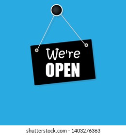 We're open on flat sign. sign with white text.