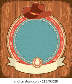 Western label background with cowboy hat on old wood texture