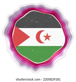 Western Sahara flag in frame. Badge of the country. Layered circular sign around Western Sahara flag. Vibrant vector illustration.