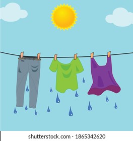 Wet Clothes Hanging On A Rope In Front Of The Sun