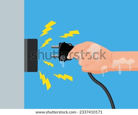 Wet hands plugging in the power, Dangerous from water danger to life and property , safety first

