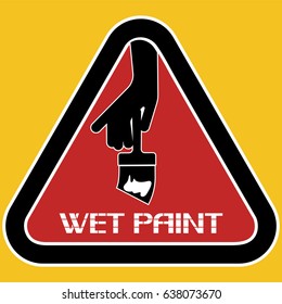 Wet paint,triangular sign.
A poster warning character about the possibility of damage when contacting an object. 
