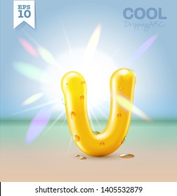 Wet Yellow Glossy Vector Font - U With Fresh Water Drops On It Hanging Over The Beach Under The Bright Sun. Vector Realistic Typeset.