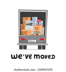 we've moved hand lettering concept. Office furniture and equipment in the back of a truck.Back view of lorry in white background. Stack pf cardboard boxes with chair, printer, plant and piles of paper