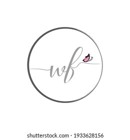 WF initial letter handwriting logo design with butterfly