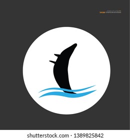 whale icon with wave on gray background.vector illustration.