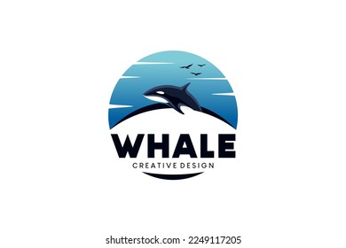 Whale logo design with blue sky background