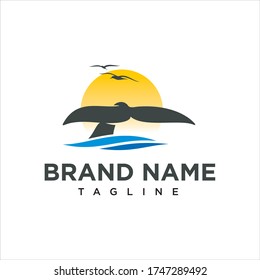Whale Tail Seagull And Wave Logo Design Vector Image
