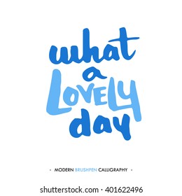 What a lovely day. Color inspirational quote isolated on white background. Handwritten quote by brush in modern calligraphy style.