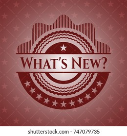 What's New? badge with red background