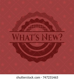 What's New? badge with red background