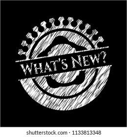 What's New? chalkboard emblem written on a blackboard