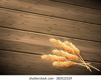 Wheat on wooden background. EPS 10 vector file included