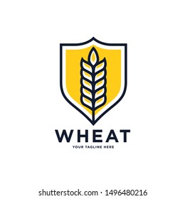 Wheat and Shield logo. Grain wheat logo design. Wheat emblem.