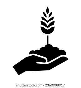 Wheat spikelet on human hand solid icon, agriculture concept, Spica grows in caring hand sign on white background, Wheat ear icon in glyph style for mobile, web design. Vector graphics