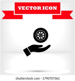 rueda en el icono de la mano , lorem ipsum Diseño plano