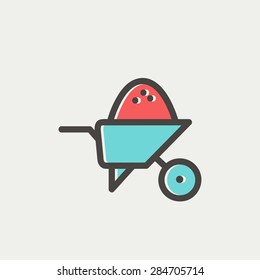 Wheelbarrow full of sand icon thin line for web and mobile, modern minimalistic flat design. Vector icon with dark grey outline and offset colour on light grey background.