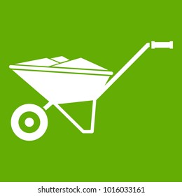 Wheelbarrow icon white isolated on green background. Vector illustration