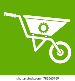 Wheelbarrow icon white isolated on green background. Vector illustration svg