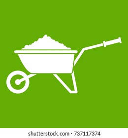 Wheelbarrow loaded with soil icon white isolated on green background. Vector illustration svg