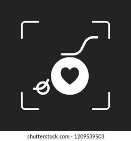 wheelchair and heart, outline icon. White object in camera autofocus on dark background