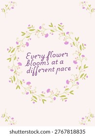 A whimsical greeting card featuring a circular floral wreath and the quote 
