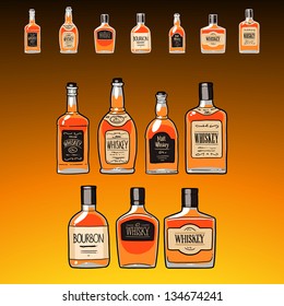 whiskey bottles set  on the dark amber background