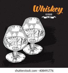 Whiskey drink. Hand drawn two glasses of whiskey. Engraving style. Vector illustration