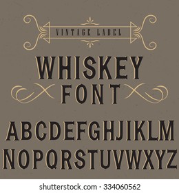 Whiskey label font and sample label design with decoration. Decoration font. Font style. Retro font. Old font. Stylized font. Vintage font.