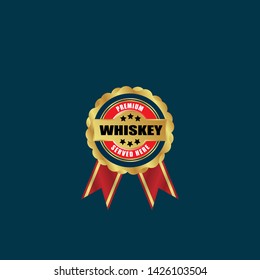 whiskey - premium. gold label with ribbon. gold emblem with ribbons.