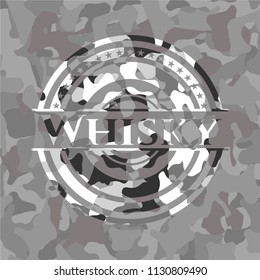 Whisky on grey camouflage pattern