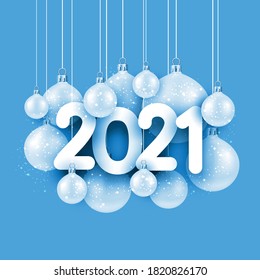 White 2021 sign among hanging light blue christmas tree toys with shiny lights. Blue background. Vector holiday illustration.