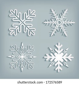 White 3d snowflakes with shadow on gray background. Editable vector format.