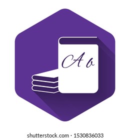 White ABC book icon isolated with long shadow. Dictionary book sign. Alphabet book icon. Purple hexagon button. Vector Illustration