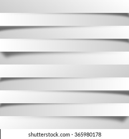 White abstract background. Stylized paper cut stripes lied on each other.