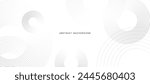 White abstract minimalist background with circle lines and dot pattern.