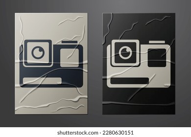 White Action extreme camera icon isolated on crumpled paper background. Video camera equipment for filming extreme sports. Paper art style. Vector Illustration