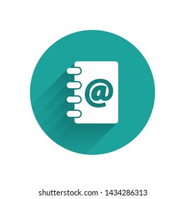 White Address book icon isolated with long shadow. Notebook, address, contact, directory, phone, telephone book icon. Green circle button. Vector Illustration