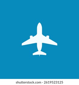 a white airplane in the blue sky
