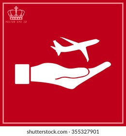 White Airplane Icon in hand - vector icon 